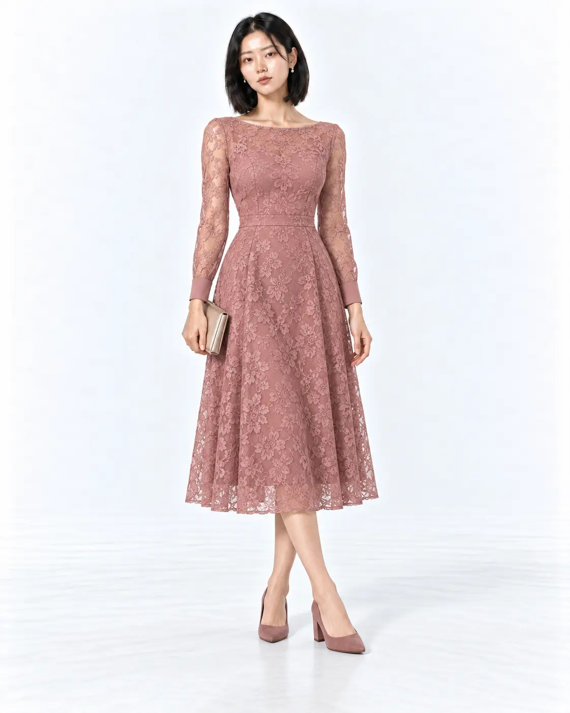 Dusty Rose Lace Fall Wedding Guest Dress Woman in a dusty rose long-sleeve lace midi dress with matching block heels against a white background.