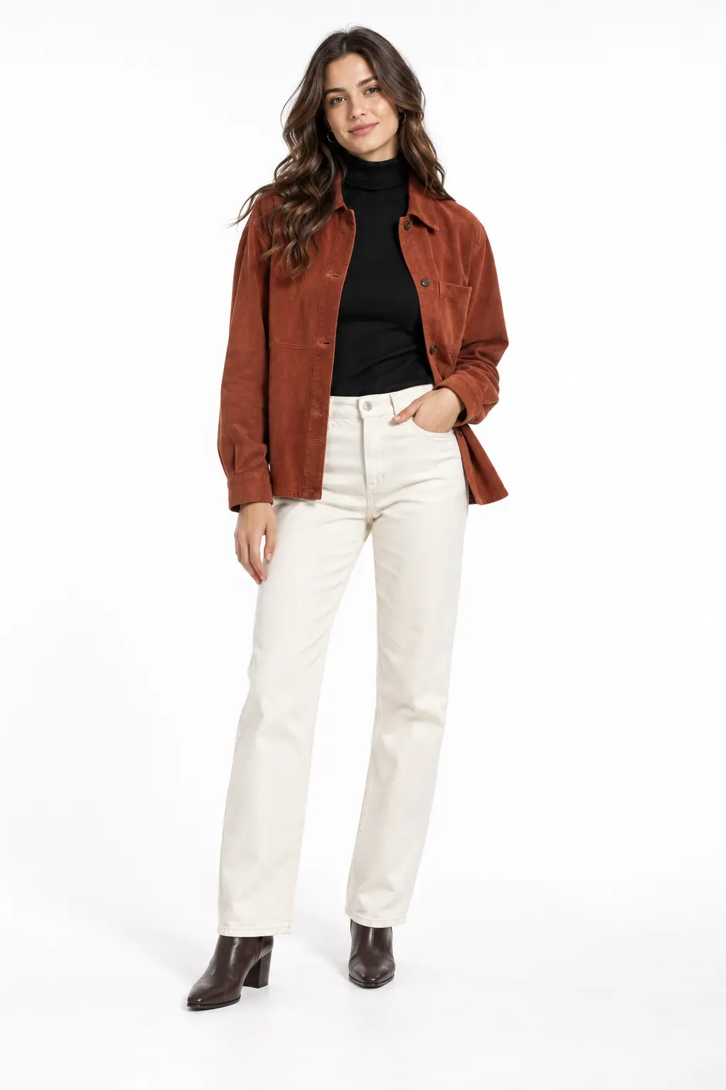 Rust Overshirt with Ecru Jeans Full-body white-studio image of a woman wearing rust suede-look overshirt; black turtleneck; ecru straight jeans; brown boots.